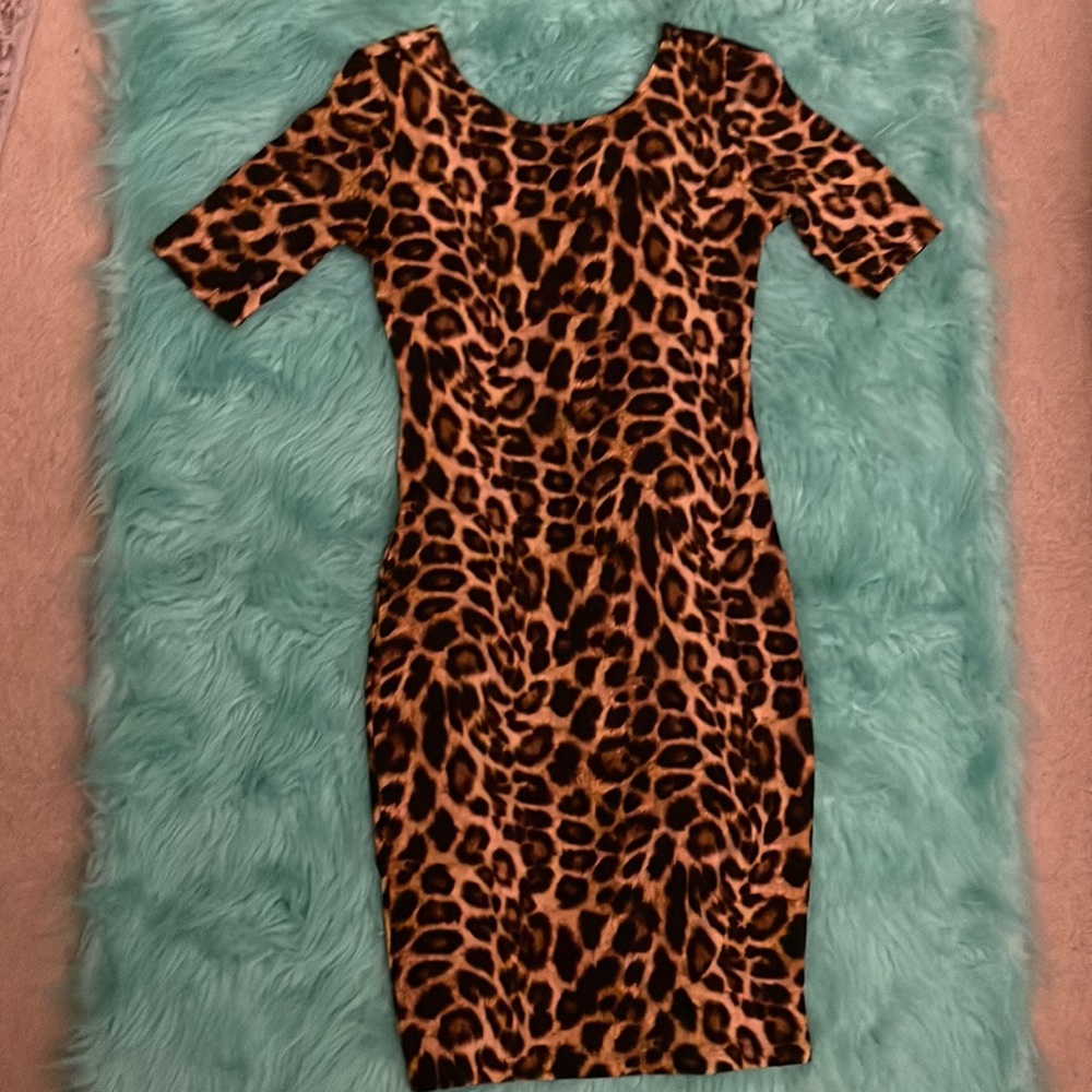 Stretchy leopard print dress. Ankle length.
